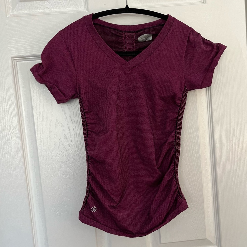 Athleta, V-neck, fitted top, ruched on front, side and back  with a cap sleeve